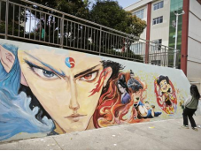 墙绘传递雷锋精神，行动践行青春使命——城市学院学子创作“哪吒”形象，为校园添彩  