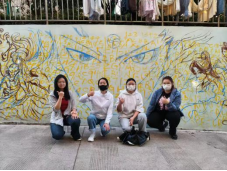 墙绘传递雷锋精神，行动践行青春使命——城市学院学子创作“哪吒”形象，为校园添彩  